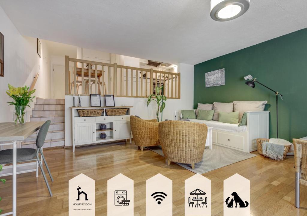 a living room with a couch and a table at Home by Doni I Zentral I Haustiere erlaubt I Balkon l 4 PAX in Wiesbaden