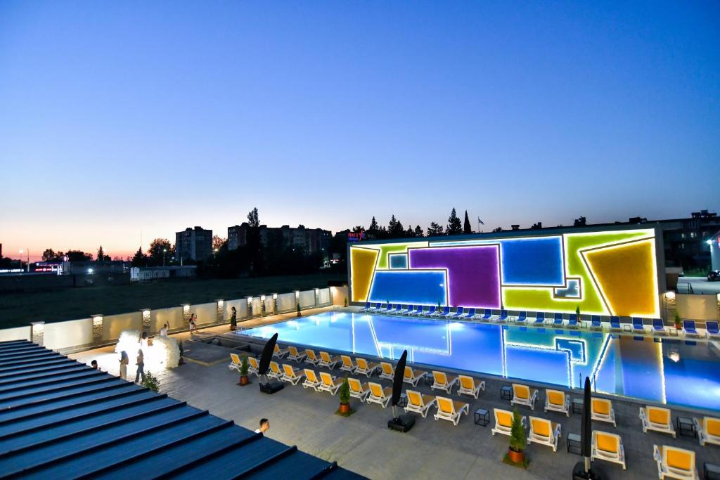a pool on the roof of a building at The West Inn-Georgia Hotel in Kutaisi