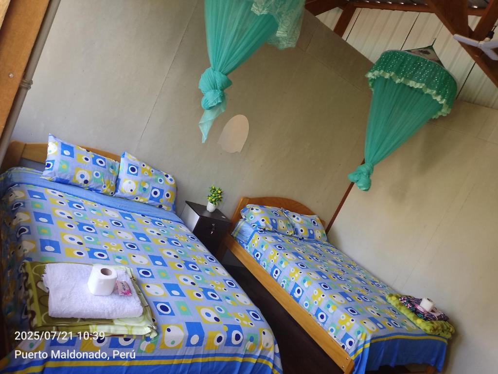 Letto o letti in una camera di Refugio Chabelita Hostel