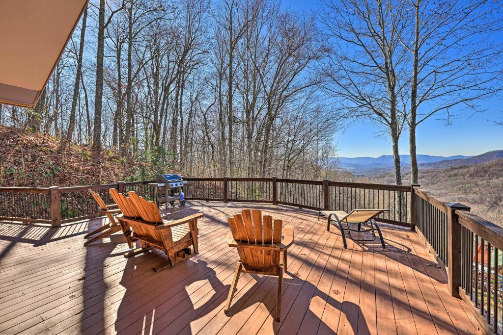 a deck with chairs and a table with a view at Spacious Franklin Cabin w/ Mountain Views! in Franklin