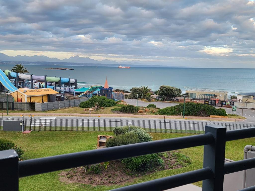 a view of the ocean from a balcony of a playground at Beautiful Sea view apartment 45 De Valle Diaz Mosselbay in Mossel Bay
