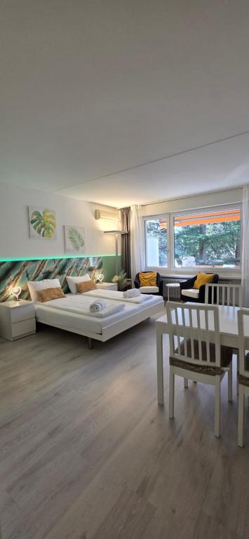 Ένα ή περισσότερα κρεβάτια σε δωμάτιο στο Residenza Lago di Lugano