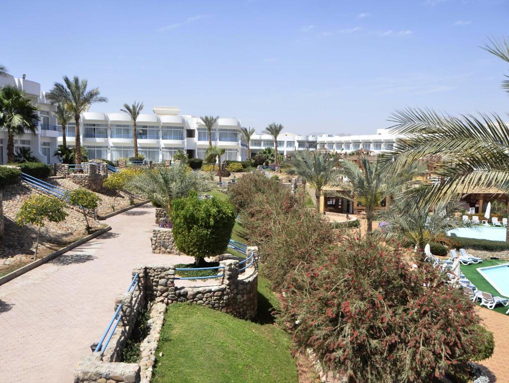 Bazén v ubytování Queen Sharm Aqua Park Hotel nebo v jeho okolí
