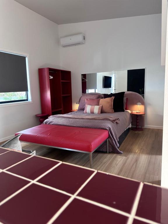 Katil atau katil-katil dalam bilik di Aurora Self Contained Studio