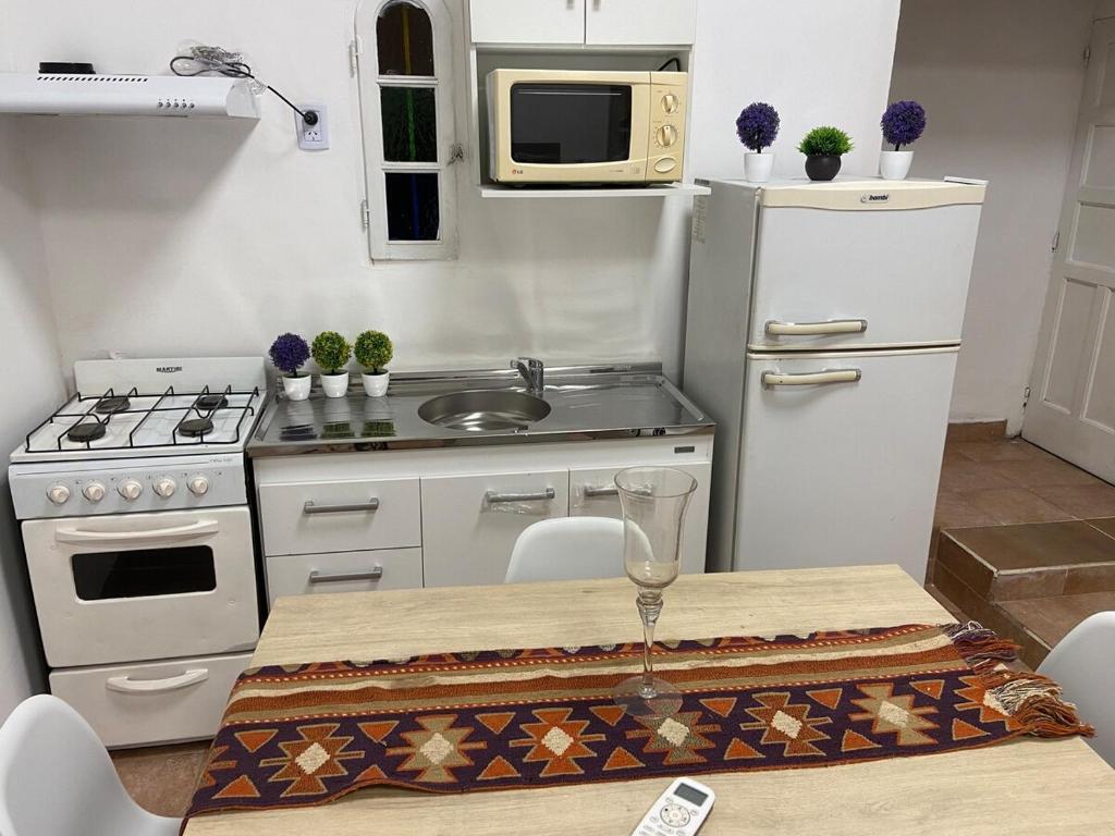 Kuchyň nebo kuchyňský kout v ubytování Alfonsina apartment in the center