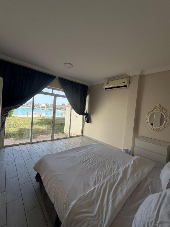 Postel nebo postele na pokoji v ubytování Meraki Resorts 15-2