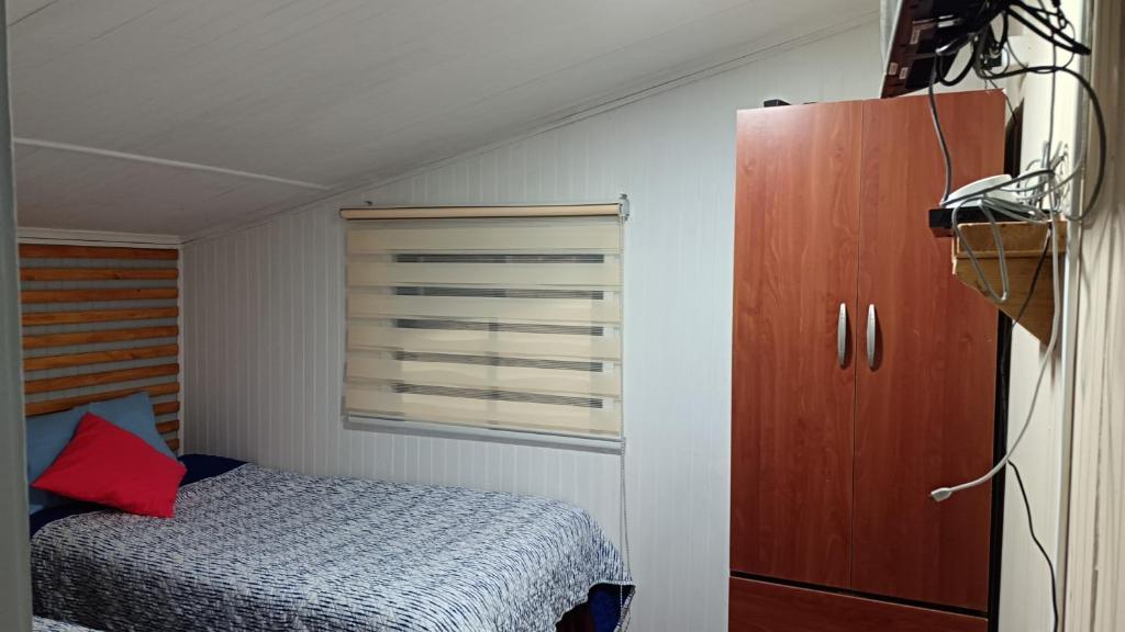 Postel nebo postele na pokoji v ubytování Cabaña Alba