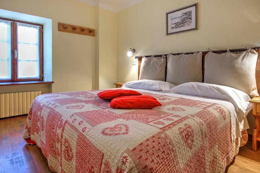 Postel nebo postele na pokoji v ubytování Hotel Locanda Belvedere