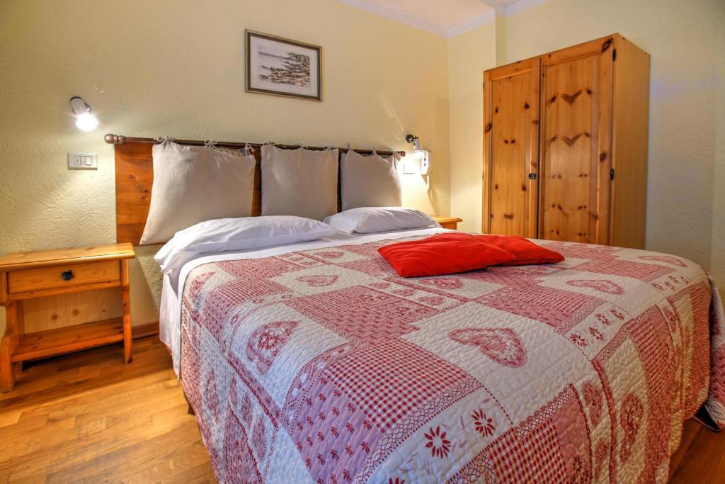 Postel nebo postele na pokoji v ubytování Hotel Locanda Belvedere