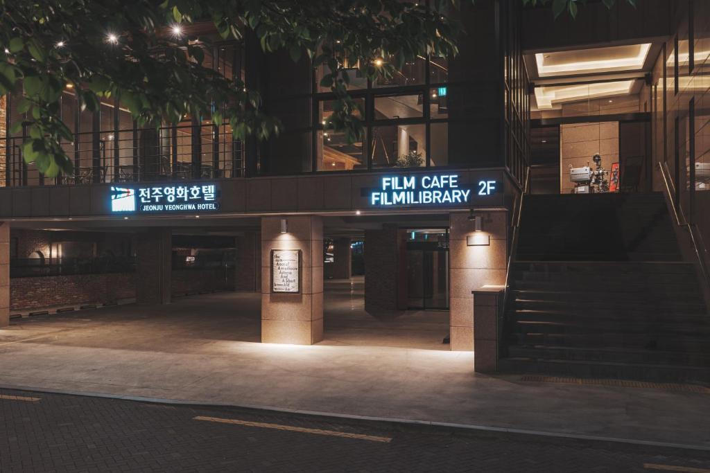 a building with a sign that reads full office halliday at Jeonju Yeonghwa Hotel in Jeonju
