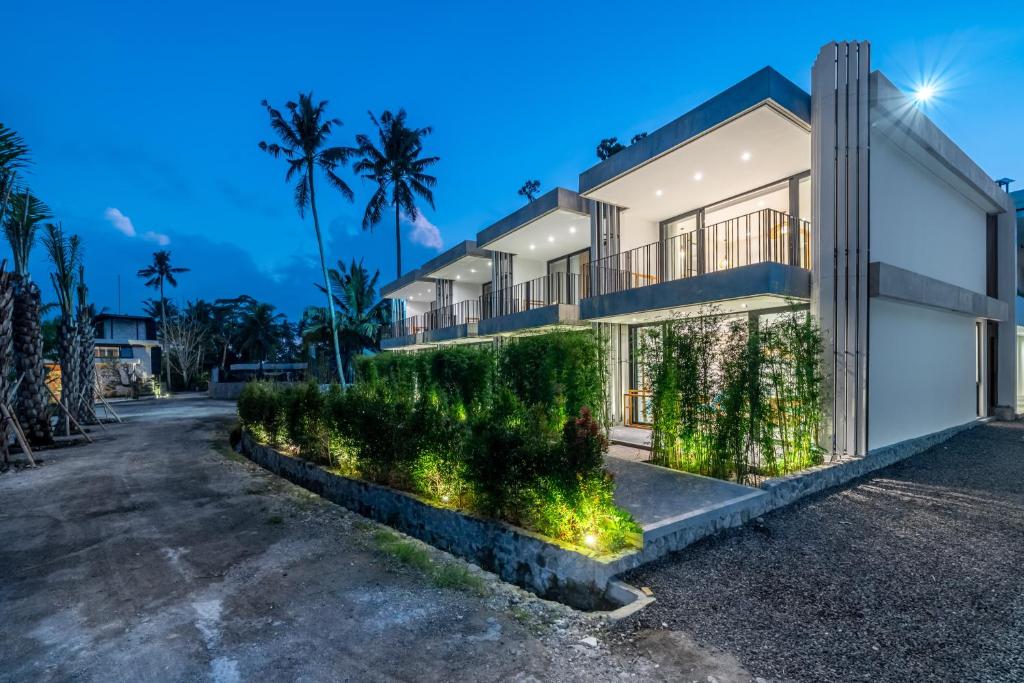 a rendering of a house at dusk at Townhouse T1 - Hidden Gem in Ubud -Townhouse in Ideal Location in Ubud