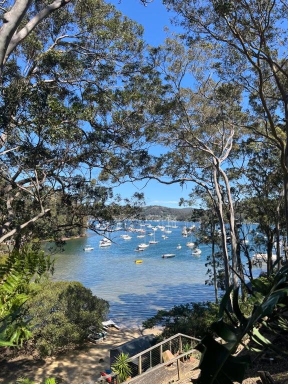 a view of a harbor with boats in the water at Sydney Northern Beaches Waterfront Pittwater Avalon Beach - Clareville in Clareville