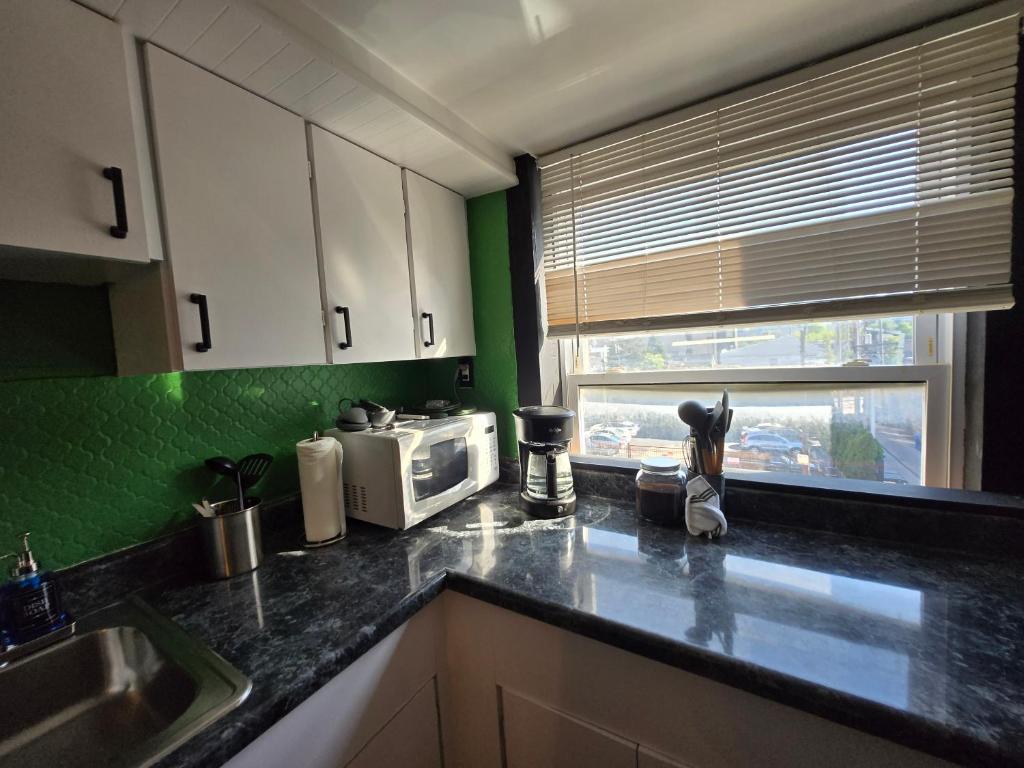 Η κουζίνα ή μικρή κουζίνα στο Grand House