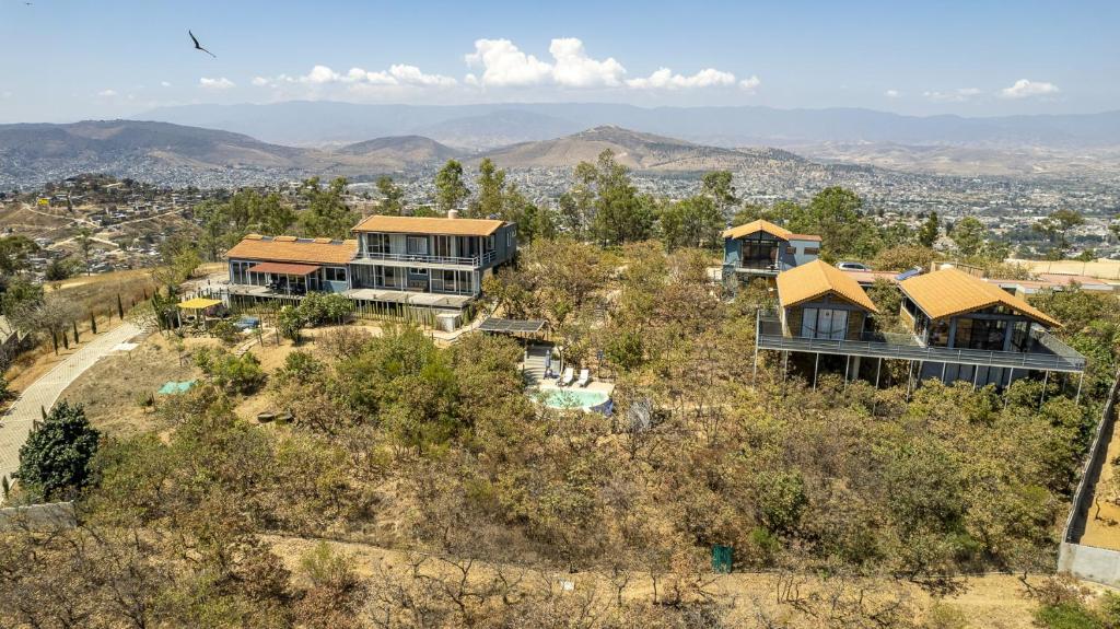 an aerial view of a house on a hill at Utopia Casas Boutique in Oaxaca City