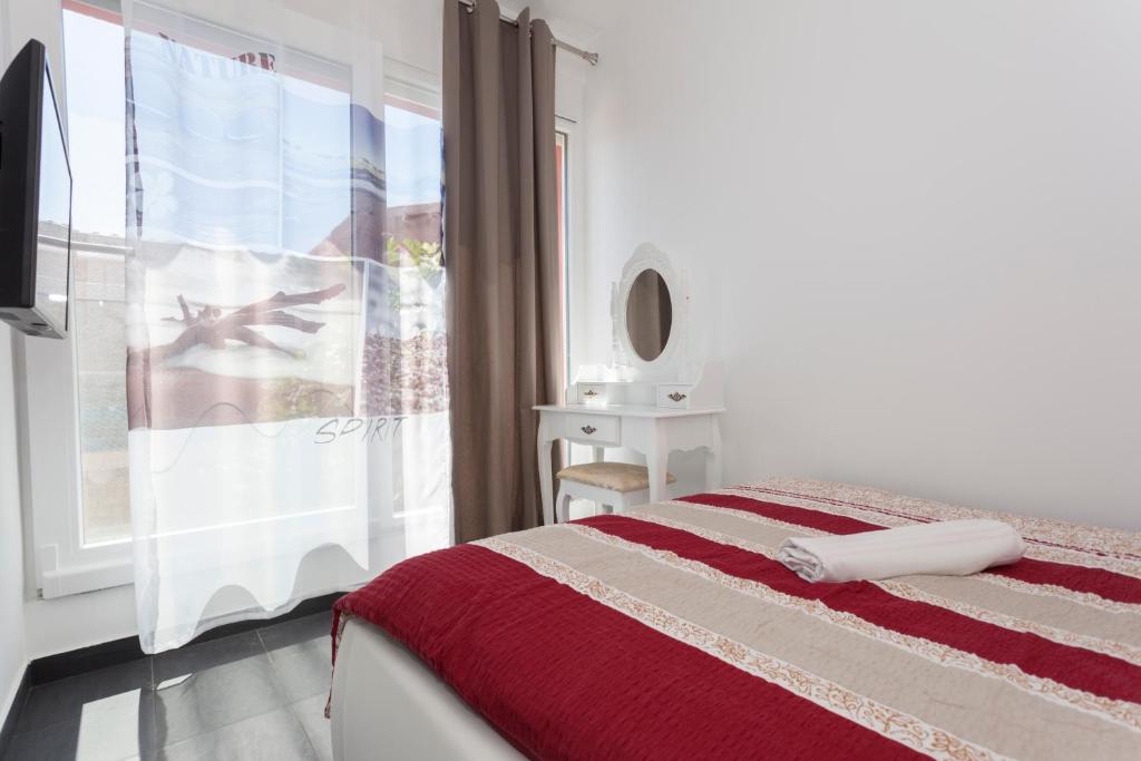 Posteľ alebo postele v izbe v ubytovaní Apartments Svetec
