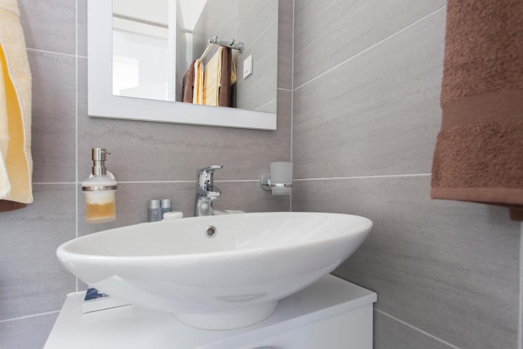 Kúpeľňa v ubytovaní Apartments Svetec