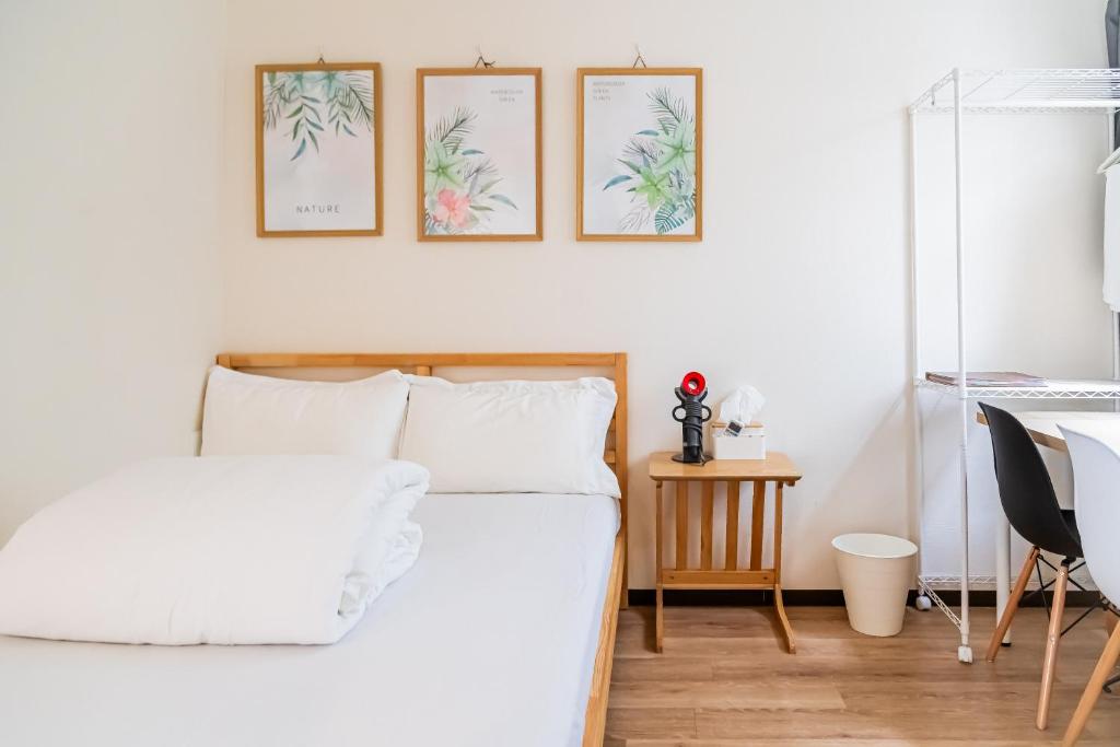 Ένα ή περισσότερα κρεβάτια σε δωμάτιο στο E JOY INN-Okubo branch