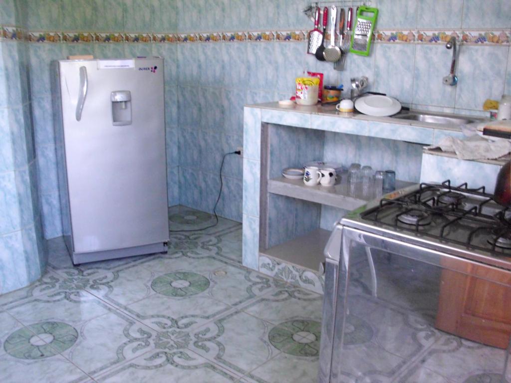 Kuchyň nebo kuchyňský kout v ubytování Hostal Alcazaba