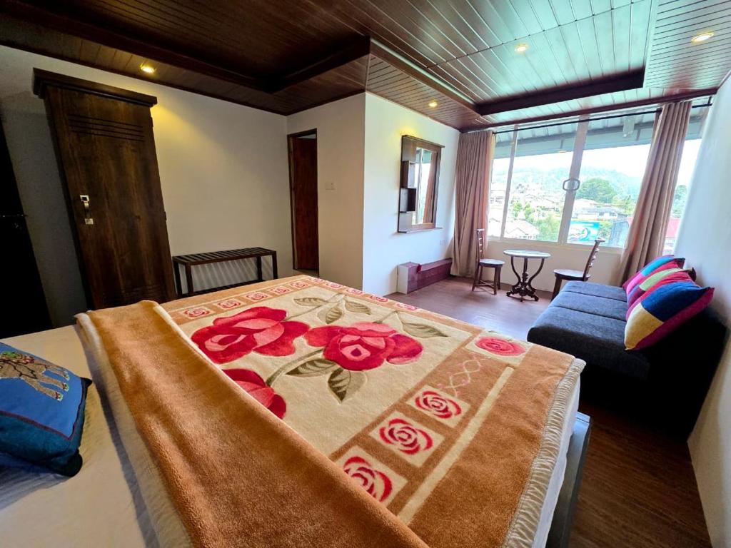 Ένα ή περισσότερα κρεβάτια σε δωμάτιο στο Sakura Hotel