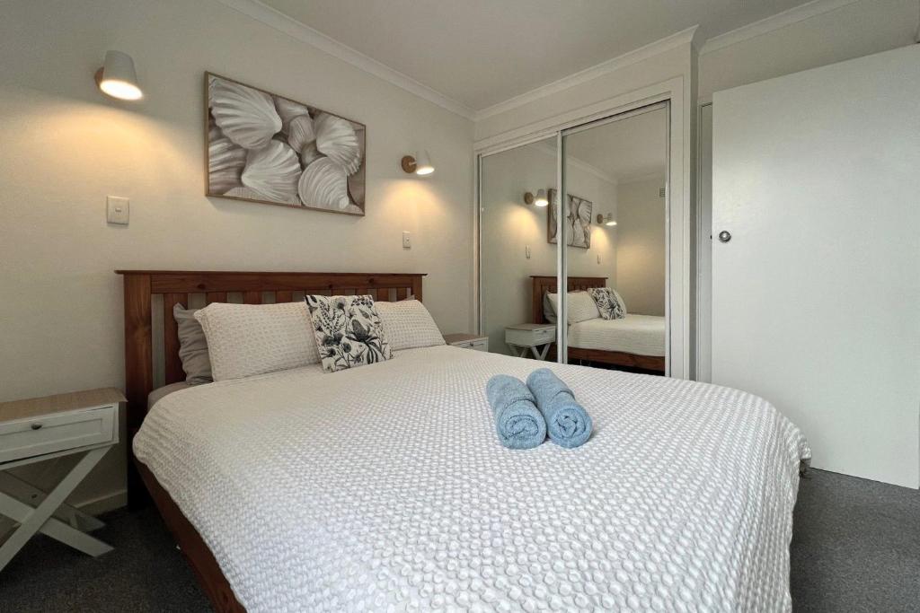 Ένα ή περισσότερα κρεβάτια σε δωμάτιο στο Surfrider 11