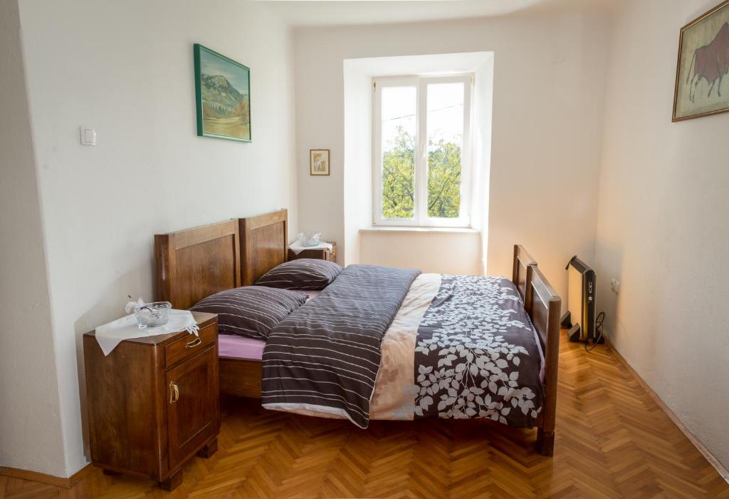 Postel nebo postele na pokoji v ubytování Vila Dane