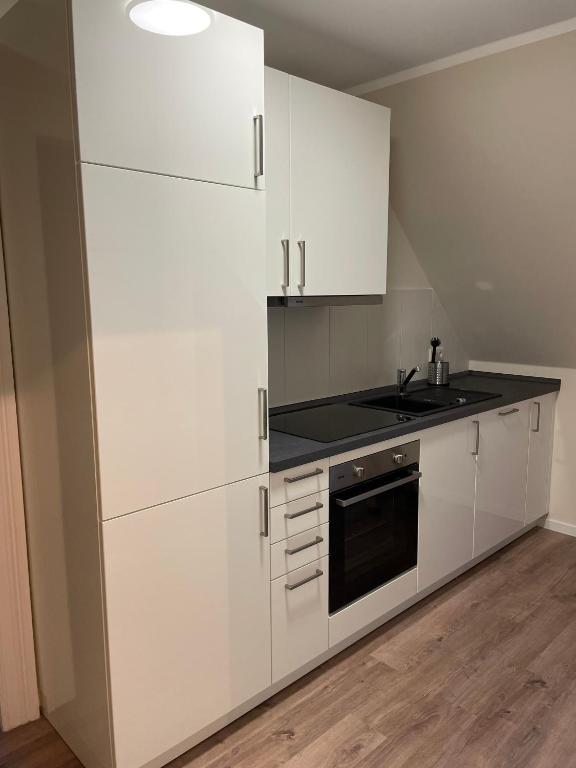 Kuchyň nebo kuchyňský kout v ubytování Fewo Haus Peters "De Lütte"