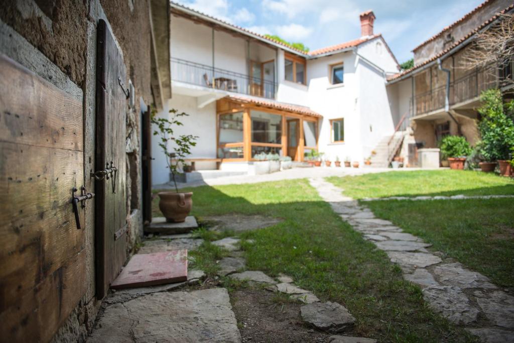 an entrance to a house with an open door at Vila Dane in Sežana