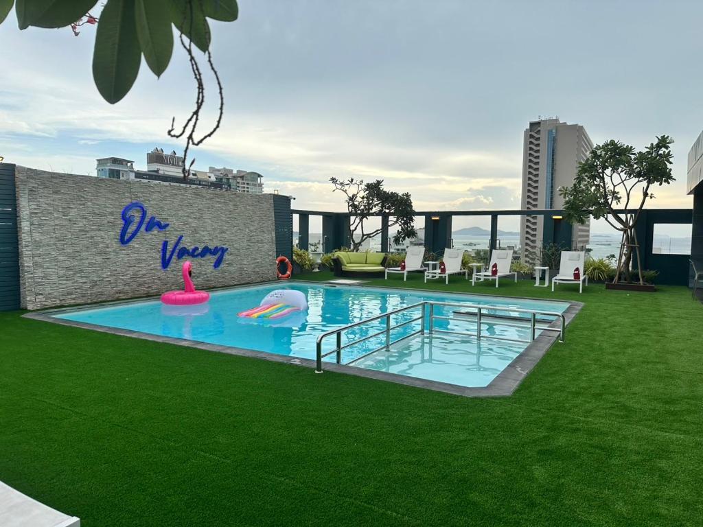 a swimming pool on top of a building at Empress Pattaya Hotel in Pattaya Central
