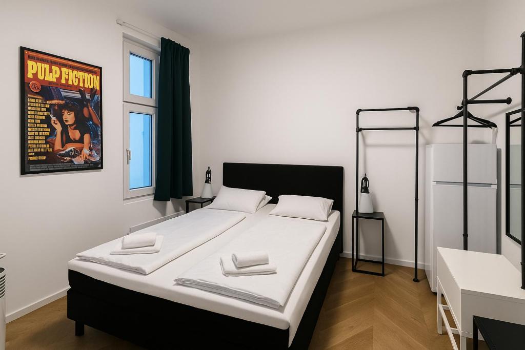 Postel nebo postele na pokoji v ubytování City Center Apartments