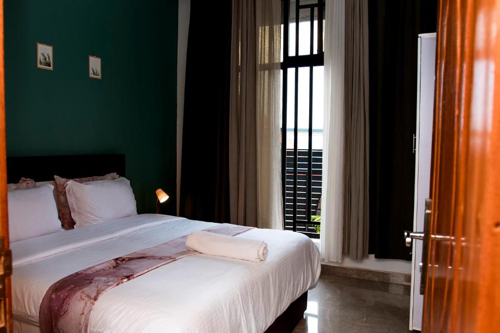 Una cama o camas en una habitación de Natamber apartment