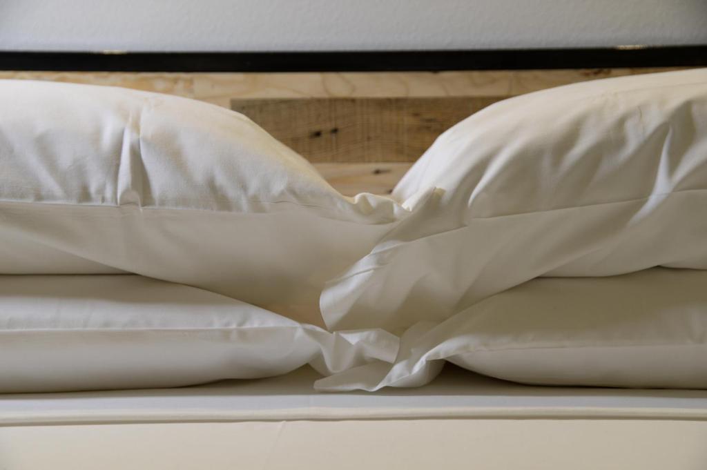 Postel nebo postele na pokoji v ubytování Piano Tre