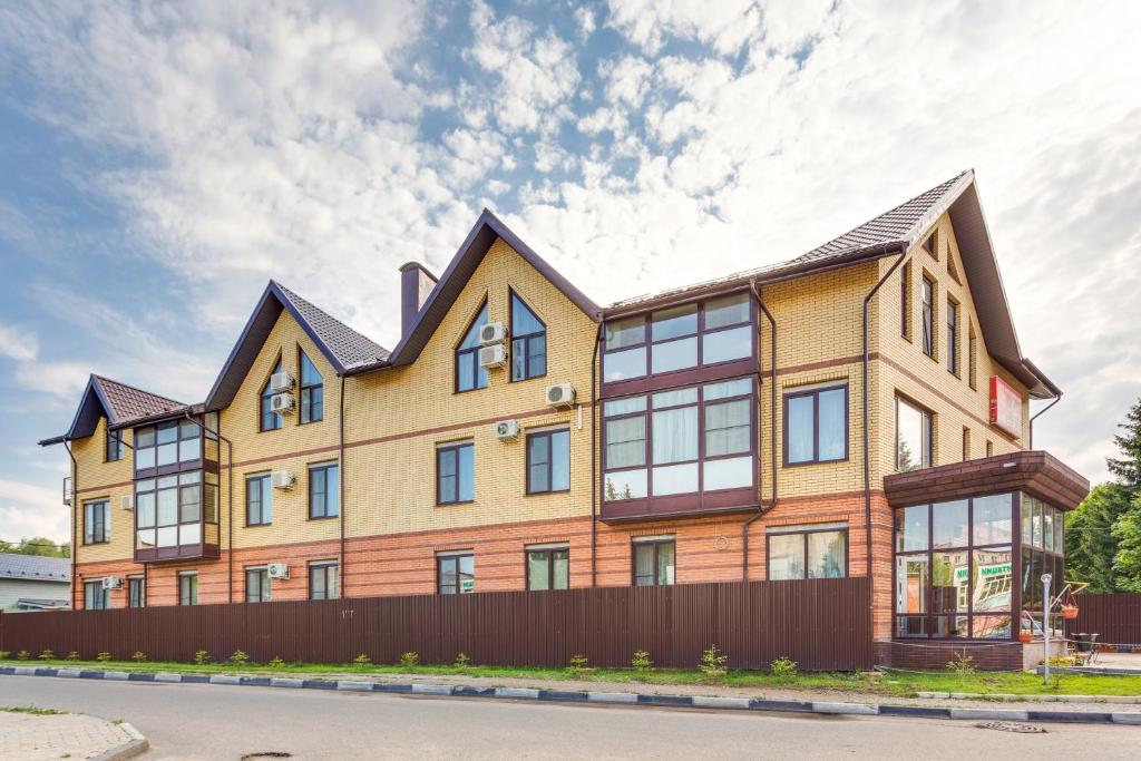 a large house with a gambrel roof at Home Room "На Мирном" in Obninsk