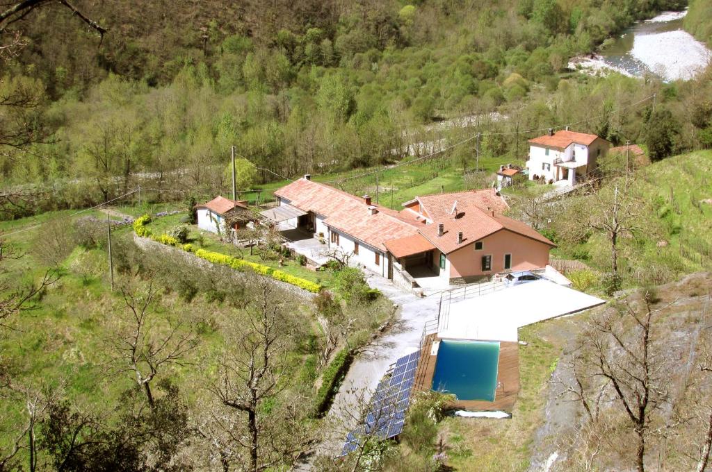 an aerial view of a house on a hill at Agriturismo Il Giglio e la Rosa in Montale