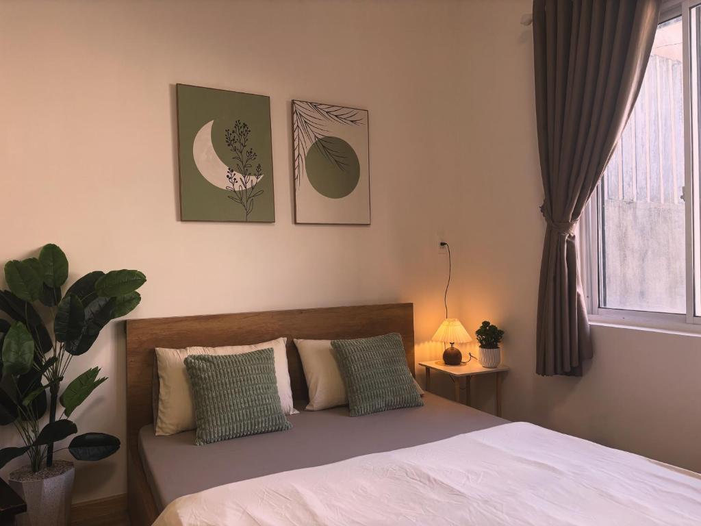 Postel nebo postele na pokoji v ubytování Central room in district 1, 450m to Ben Thanh market