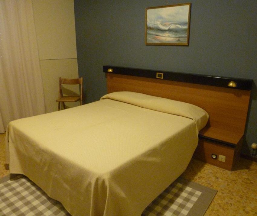 Postel nebo postele na pokoji v ubytování Hotel Da Cesare