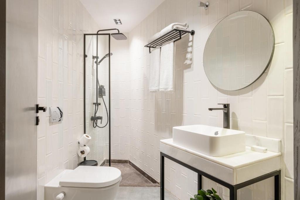 grey l studio apartments Downtown Cairo Ouzonian House - 6