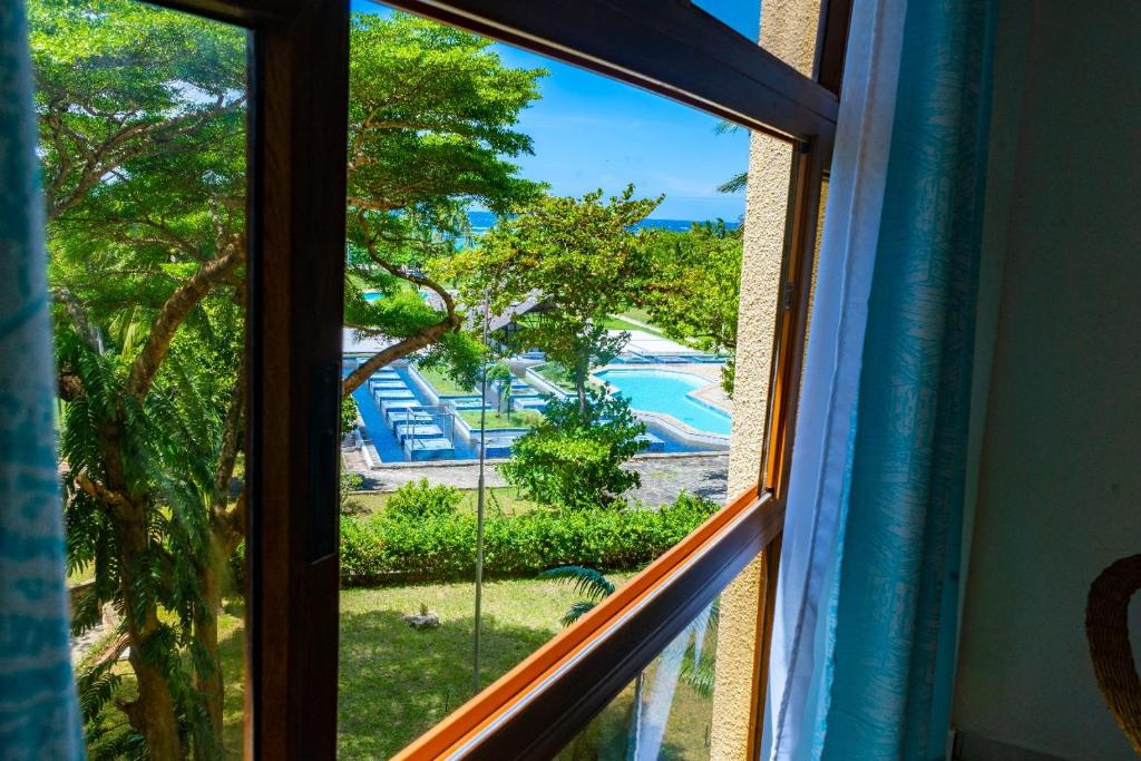 Bazén v ubytování Golden Sun-Diani Beach nebo v jeho okolí