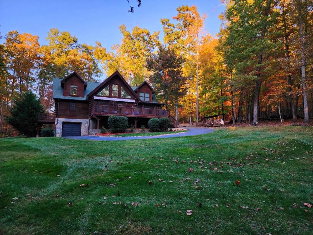 a large house in the middle of a field at Wilderness retreat in Marion