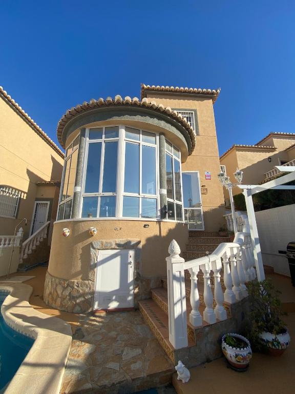 a house with a pool in front of it at Casa iris in San Miguel de Salinas
