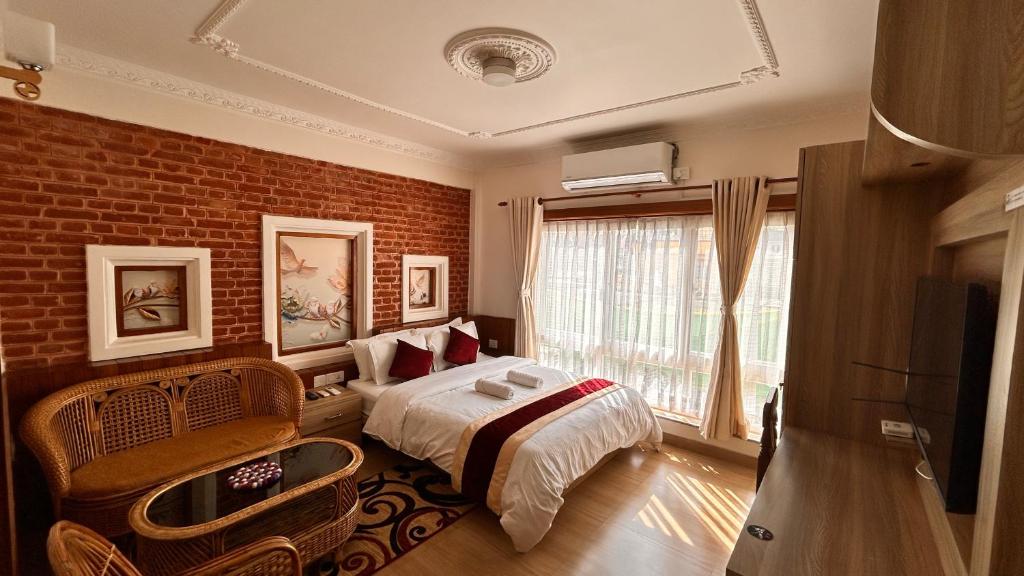 Katil atau katil-katil dalam bilik di Raniban Suites - Apartment Home
