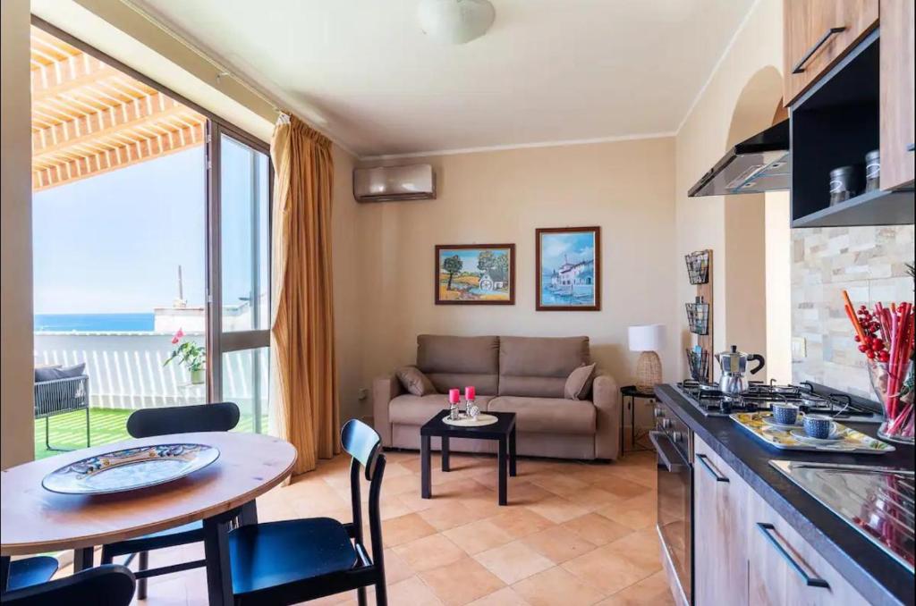 Posezení v ubytování I Faraglioni Comfort Rooms
