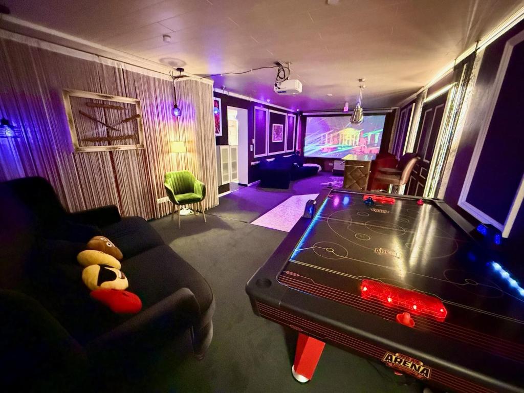 Herní místnost v ubytování Premium Stay Academy - Luxus-Ferienwohnungen mit Erlebnis