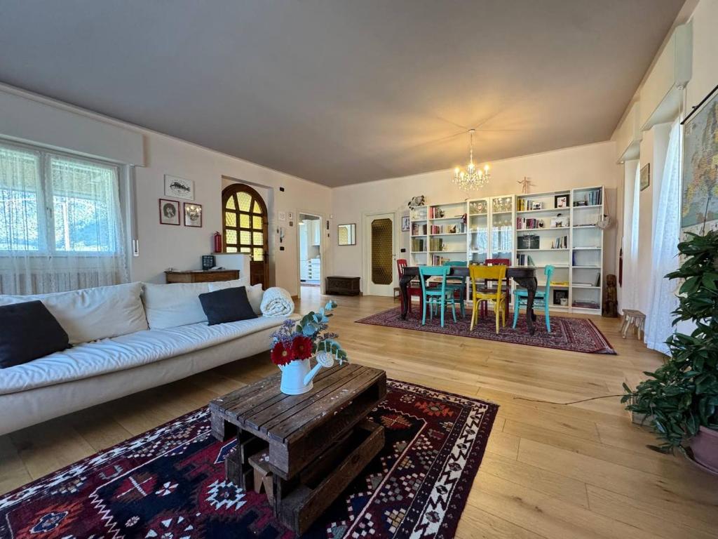 a living room with a couch and a table at Il Nido di Adele in Sernio