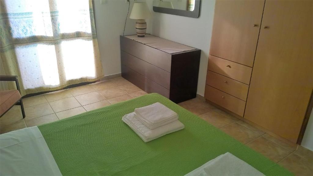 Postel nebo postele na pokoji v ubytování House of Polymnia