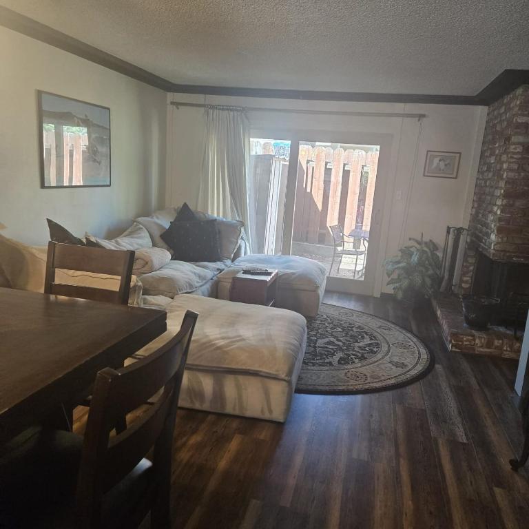 a living room with a couch and a table at Lakeside Dreamzzz in Tahoe Vista