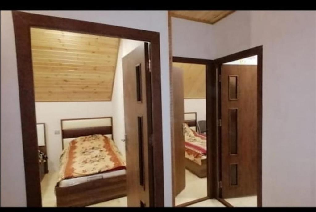 Llit o llits en una habitació de Bağ evi