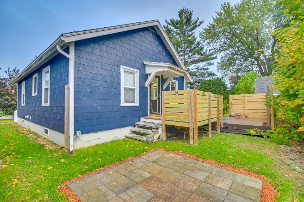 a blue tiny house in a yard at 2 Mi to Colby College Peaceful Home in Waterville in Waterville