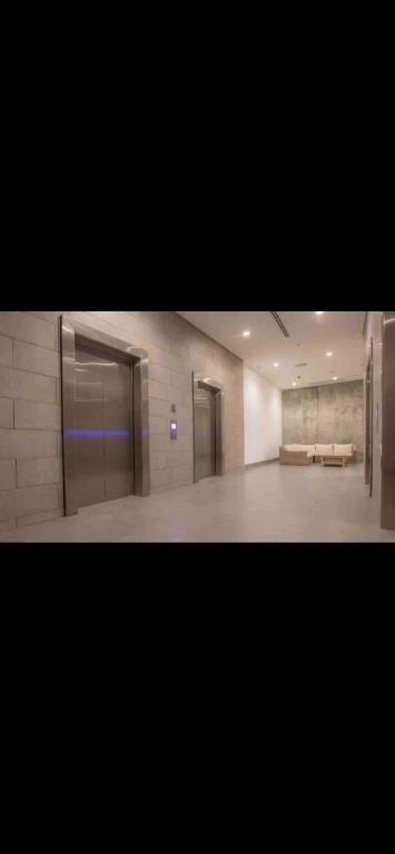 a large room with two elevators in a building at I bedroom luxury in Cartagena in Cartagena de Indias