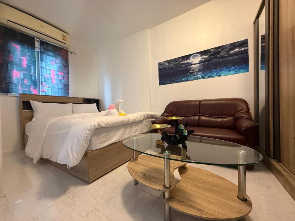 Postel nebo postele na pokoji v ubytování Cha Cha Guesthouse