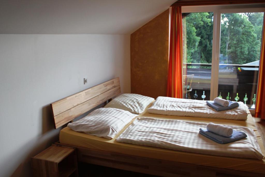 Postel nebo postele na pokoji v ubytování Naturgut Gailtal